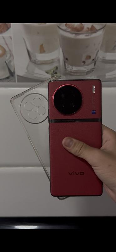 смартфоны vivo: Vivo X90, красный цвет (задняя панель под кожу). В комплекте — 1