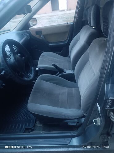 Mazda: Mazda 323: 1991 г., 1.6 л, Механика, Бензин, Хэтчбэк — 8