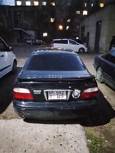 Mazda: Mazda 626: 1999 г., 2.5 л, Механика — 7