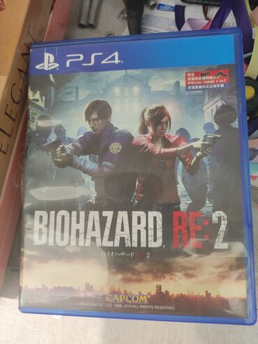 PS4 (Sony PlayStation 4): Продаю Biohazard re 2
коробка чучуть повреждена 
одам за 1500