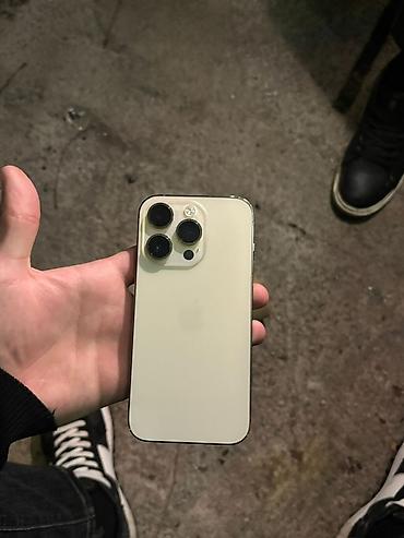 iphone x max ikinci el: IPhone 14 Pro, 128 GB, Matte Gold, Barmaq izi, Face ID, Simsiz şarj — 1