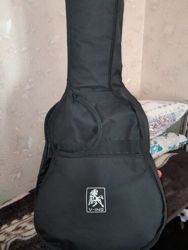 lalafo gitara: Klassik gitara, Yeni, Ünvandan götürmə