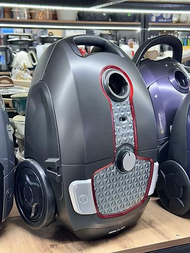 Пылесос Midea с мешковым сбором пыли и HEPA-фильтром. Ключевые