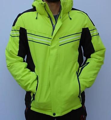 north face kacket: Muška jakna u neon žutoj boji, dizajnirana za skijanje. Poseduje — 7