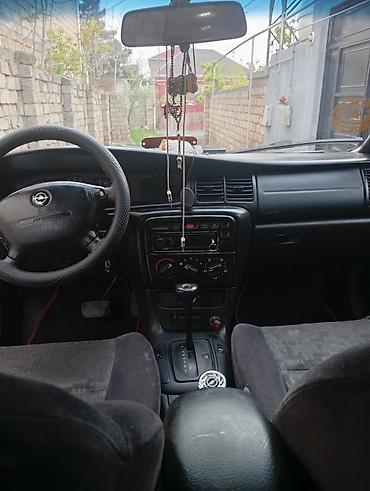 2005 kia sephia: Opel Vectra: 1.8 l | 1998 il 2000388 km Sedan — 6