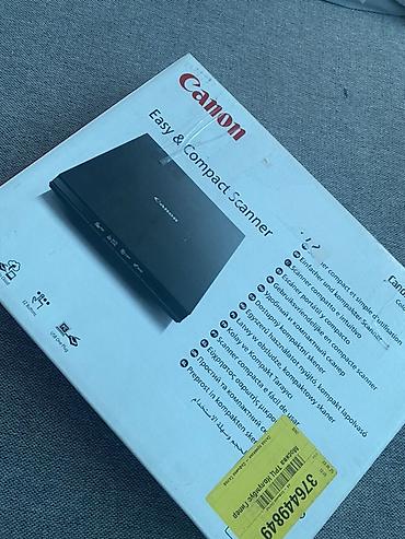 Офистик техника: Сканер Canon — компактный и простой в использовании планшетный сканер — 1