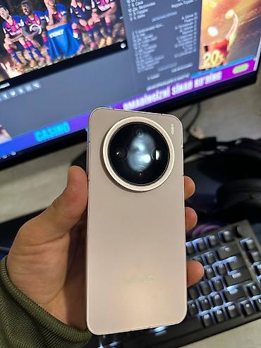 Vivo X200 Pro mini, Б/у, 512 ГБ, цвет - Розовый, 2 SIM at lalafo.kg Vivo X200 Pro mini, Б/у, 512 ГБ, цвет - Розовый, 2 SIM