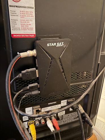 купить тв бу: Televizor LG 107 ekran krosnu aparatı antenası və altındakı şkafla — 2