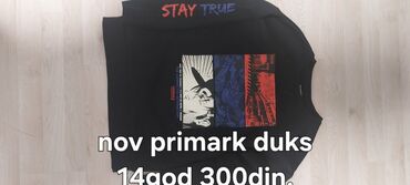 Duksevi: Dečiji duks sa kapuljačom bež boje. Dukserica ima crni rajsferšlus i — 5