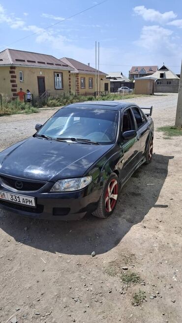 обмен квартиры: Mazda Protege: 2001 г., 2 л, Автомат, Газ