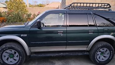 диски на авто: Mitsubishi Montero: 2002 г., 3.5 л, Автомат, Бензин, Внедорожник — 9