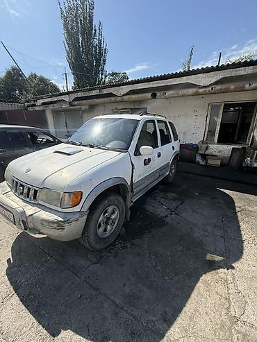 танден: Kia Sportage: 1995 г., 2 л, Механика, Дизель, Внедорожник — 4