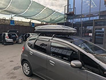 автобокс: Автобокс на крышу автомобиля - Тип: багажный бокс на крыше, крепление — 3