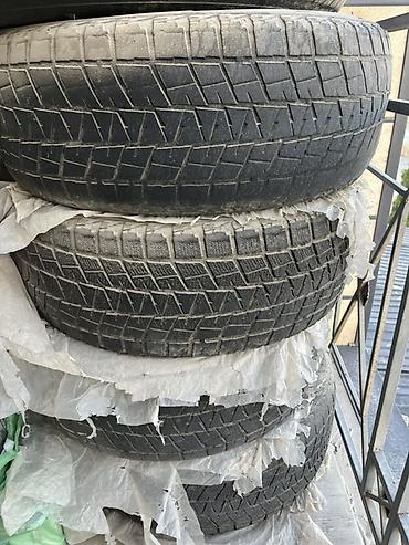 60: Шины 265 / 60 / R 18, Зима, Б/у, Комплект, Внедорожные (АТ/МТ), Bridgestone — 1