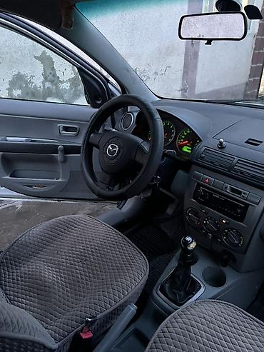 купить девятку: Mazda Demio: 2003 г., 1.3 л, Механика, Бензин, Хэтчбэк — 9
