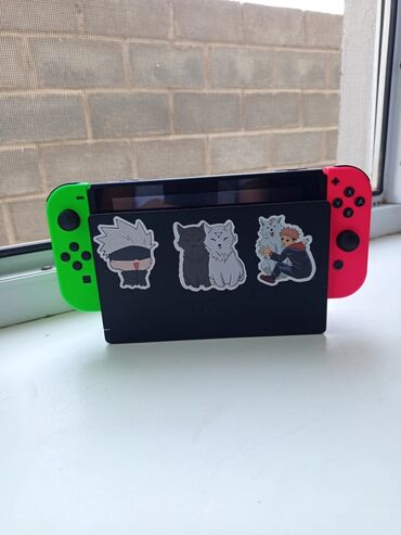 джойстик для пабга на телефон: Портативная игровая консоль Nintendo Switch в черном корпусе с