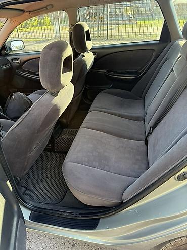 смешанный: Toyota Avensis: 2002 г., Механика, Бензин, Универсал — 3