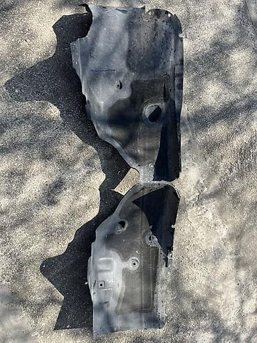 tesla charger: Maşının üstündən çıxarılıb.
Tesla Model 3 podkrılnik
Podkrilnik — 2