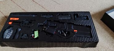 лошадка игрушка: Модель FN P 90 брэнд : WEIHUI состояние бомба 💥💥 сам пулемет стоит 2