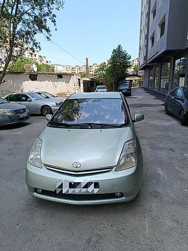 disk: Toyota Prius (2-ci nəsil) hibrid hetçbek - Rəng: açıq yaşıl/metalik - — 1
