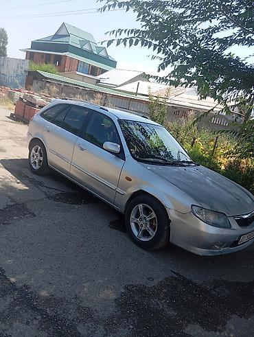 демио пороги: Mazda Familia: 2002 г., 1.6 л, Механика, Бензин, Универсал — 7