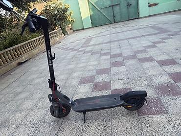 ninebot e2 pro: Segway elektrik skuter. Yenidir. 1 ay işlənib Şəkillərdə qara rəngli — 1