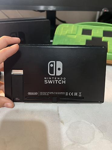 Nintendo Switch: Nintendo Switch (модель с док-станцией) Комплектация: - консоль — 5