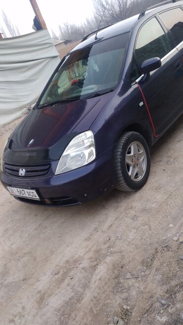 воздушный домкрат для авто: Минивэн Honda Stream темно-синего цвета с рейлингами на крыше