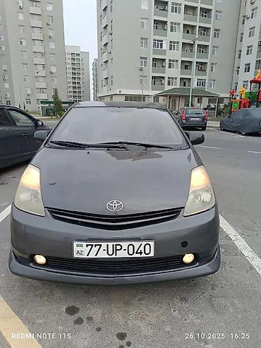 prius salon: Toyota Prius (2-ci nəsil) hibrid hetçbek - Kuzov: hetçbek, tünd boz — 7