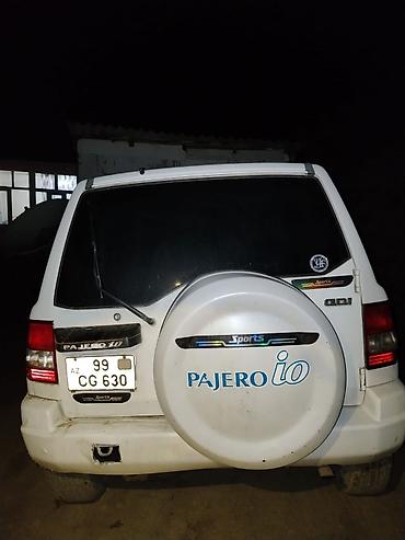 Mitsubishi: Mitsubishi Pajero iO (qısa kuzov, 3 qapı) – ağ rəngdə, şəhər və ofroud — 3