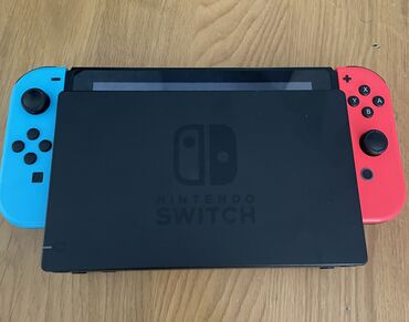 2 neferlik oyunlar: Nintendo Switch Yashi veziyyetdedi, sol stik ishleyir amma basilmir