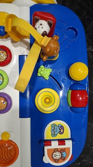 Детские ходунки: Развивающий центр Chicco Baby Steps, выполненный в сине-бело-желтой — 9