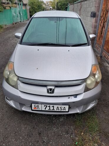 машиналар: Honda Stream, правый руль, серебристый цвет кузова. объем 1.7 2003