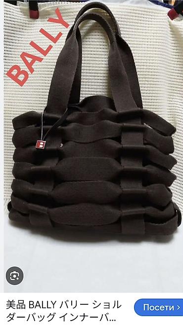 Torbe: BALLY prelepa torba sa prorezima. Dno je od kože kao i ručke, a torba — 12