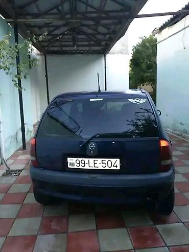 Opel: Opel Corsa B, 5 qapılı hetçbek - Kuzov: tünd mavi rəng, kompakt ölçü — 3