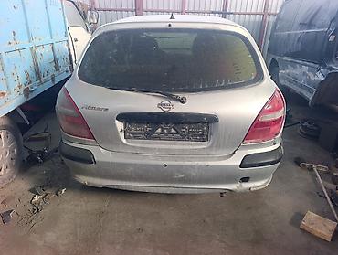 daewoo matiz 2002: Nissan Almera N16 серебристый хэтчбек (5 дверей) Характеристики и — 3