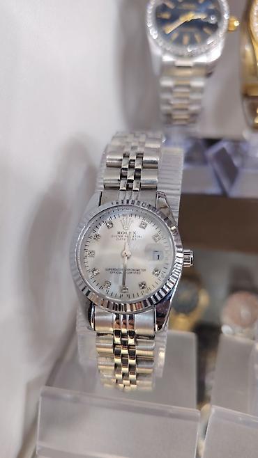 3d saat: Qızılı rəngdə klassik dizaynlı qol saatı - Model: “Oyster Perpetual — 8