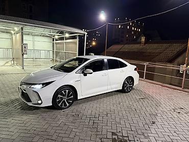byd e3: Toyota Corolla: 2022 г., 1.8 л, Вариатор, Гибрид, Седан — 2