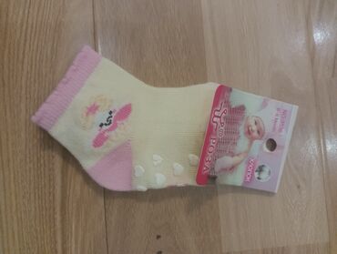 вещи для новорожденного: Продам детские носочки «РОЗА», кремово-розового цвета. На подошве