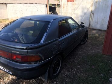 Mazda: Mazda 323: 1994 г., 1.6 л, Механика, Бензин, Хэтчбэк — 4