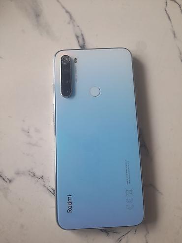 мета очки: Смартфон Xiaomi Redmi (линейка Redmi), градиентный синий цвет корпуса — 1