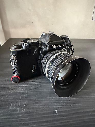 nikon 50mm: Analog lent ile Nikon FE fotoaparat. Uzerinde Ideal veziyyetde Nikkor — 1