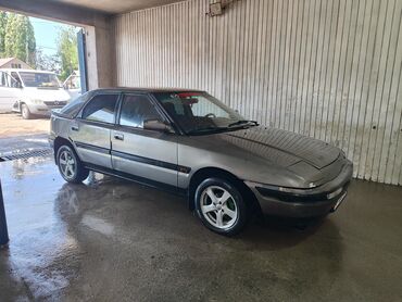 Mazda: Mazda 323: 1991 г., 1.6 л, Механика, Бензин