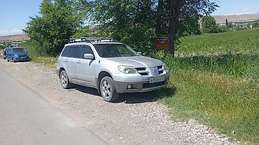 жондер прес: Mitsubishi Outlander: 2002 г., 2.4 л, Автомат, Бензин, Кроссовер — 5