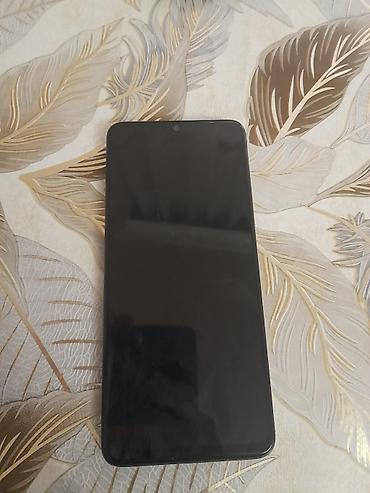 yeni modemler: Redmi A3, 128 GB, rəng - Qara, Düyməli — 3