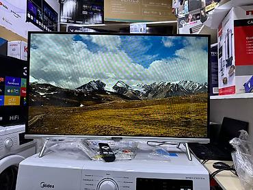 Телевизоры: Телевизоры LED Skyworth 32STE6600 в элегантном сером корпусе с — 30