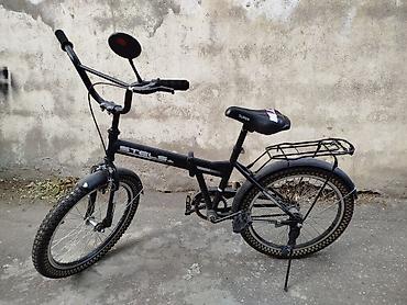 Velosipedlər: Uşaq/yeniyetmə velosipedi – Stels, 20" təkər ölçüsü. Xüsusiyyətlər: - — 2