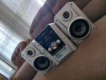iki: Panasonic mini Hi‑Fi/DVD musiqi sistemi - Marka/model: Panasonic DVD — 1