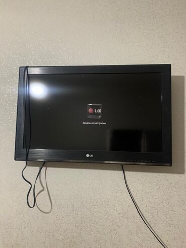 Телевизоры: Телевизор LG с плоским экраном и черной рамкой. Подходит для просмотра