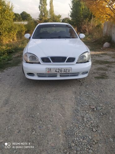 машину пассат: Daewoo Lanos: 1998 г., 1.5 л, Механика, Бензин, Седан